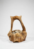 Natural Wonders USA burl wood basket with integrated handle, 7" round x 15" tall, showcasing unique grain patterns and organic texture.