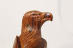 Natural Wonders USA hand-carved wooden eagle figurine. Dark wood with visible grain and polished finish.