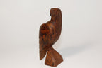 Natural Wonders USA hand-carved dark wood eagle figurine with detailed feathers and natural grain patterns.