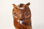 Natural Wonders USA hand-carved dark wood owl figurine with intricate feather details and natural grain.