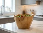 Natural Wonders USA handcrafted light brown cedar wood bowl, 8" tall, with a wavy rim and natural grain patterns. Food safe.