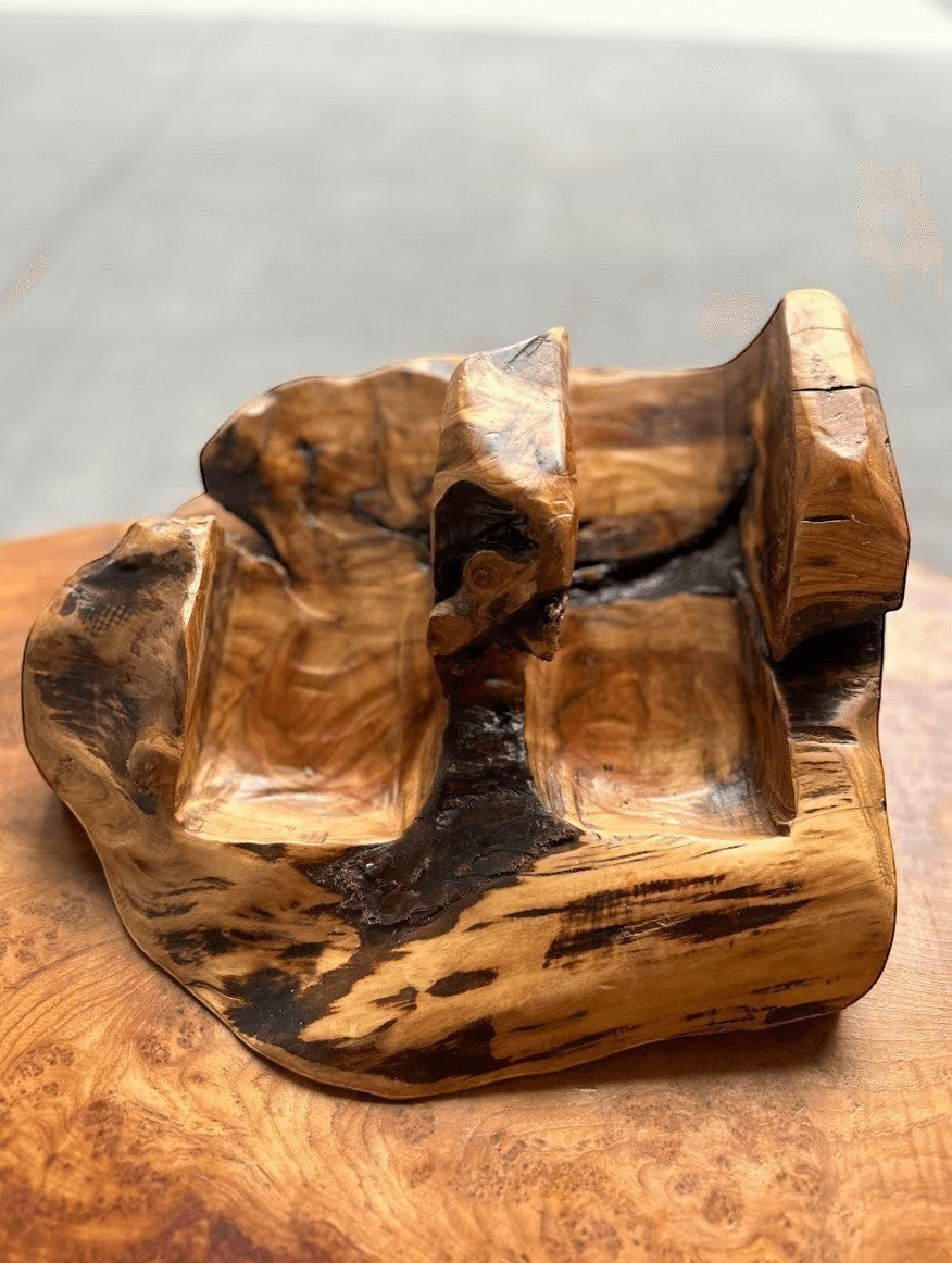 Natural Wonders USA Cedar Burl 2 Bottle Wine Holder with unique natural grain patterns, rustic charm, and dark accents.