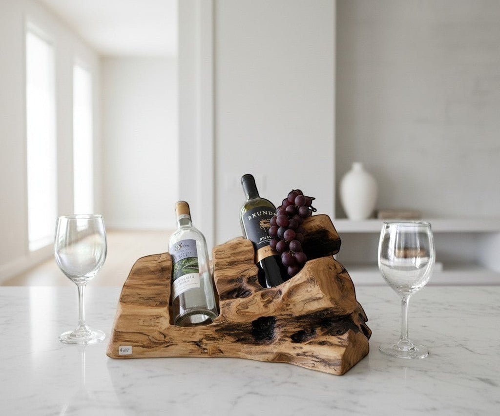 Natural Wonders USA cedar burl wood wine holder with two bottles and grapes. Rustic design.