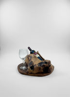 Natural Wonders USA cedar single bottle wine holder with a wine glass and bottle. Rustic wood design.