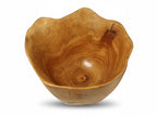 Natural Wonders USA food safe cedar wood bowl with wavy rim and natural grain pattern. 8" H x 10" L x 11" W.