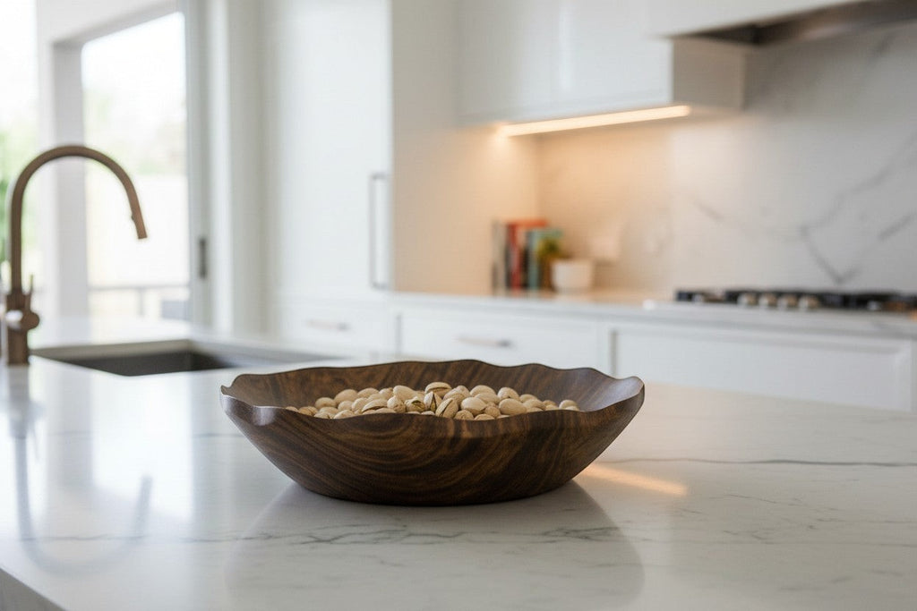 Natural Wonders USA hand carved dark wood serving bowl with organic shape and wavy rim.