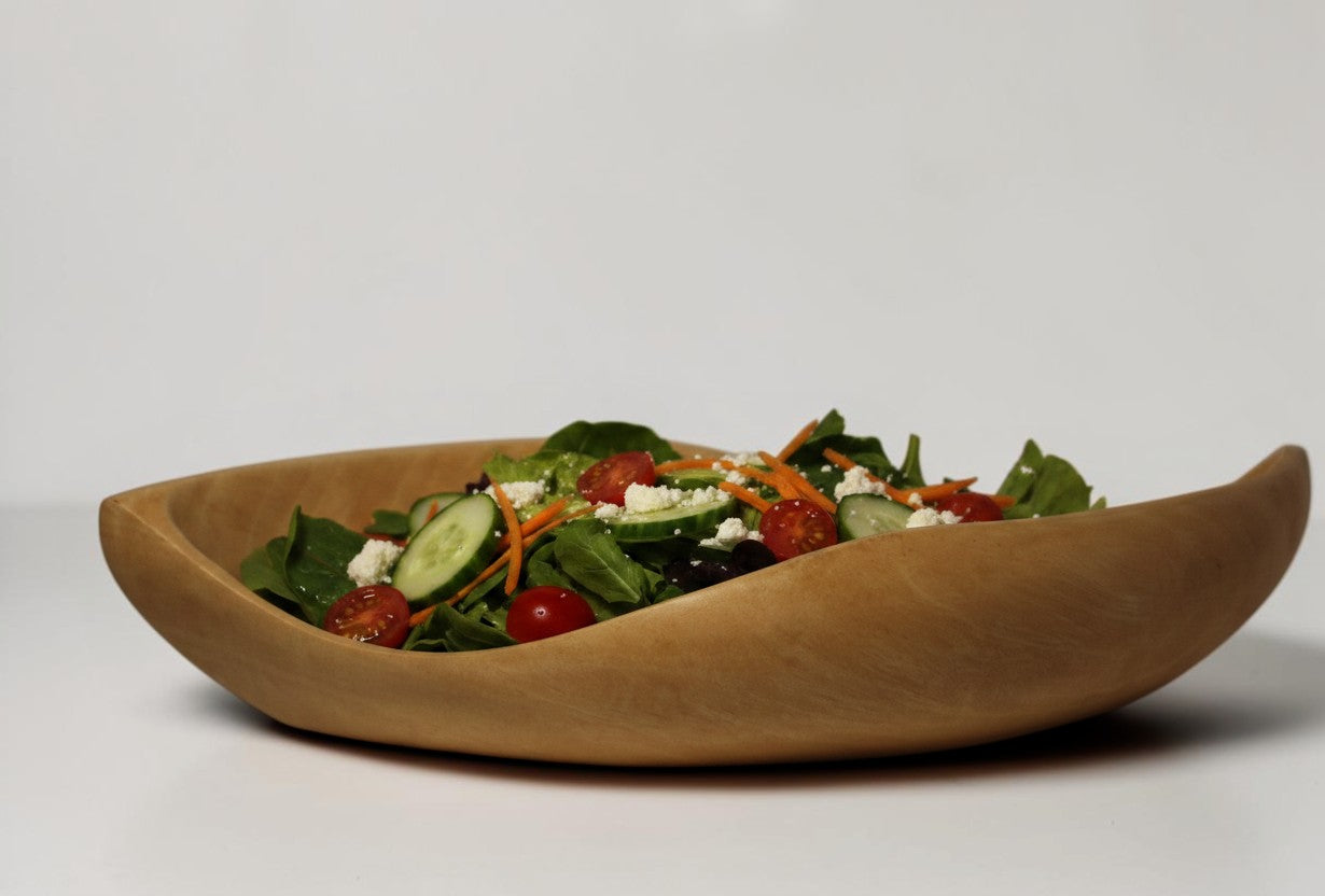 Natural Wonders USA light wood serving bowl, hand carved with organic shape and smooth matte finish.