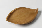 Natural Wonders USA light wood serving bowl with organic shape and smooth matte finish.