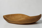 Natural Wonders USA hand carved light wood serving bowl with organic shape and matte finish.
