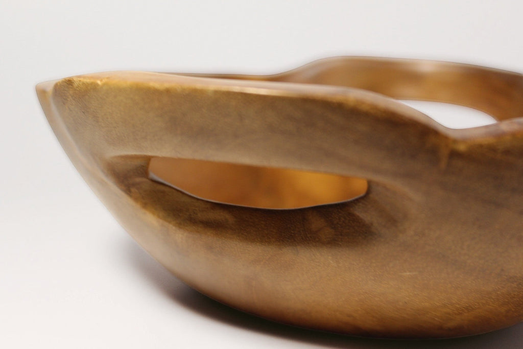 Natural Wonders USA hand carved wooden serving bowl with integrated handles, warm brown tone, smooth finish.