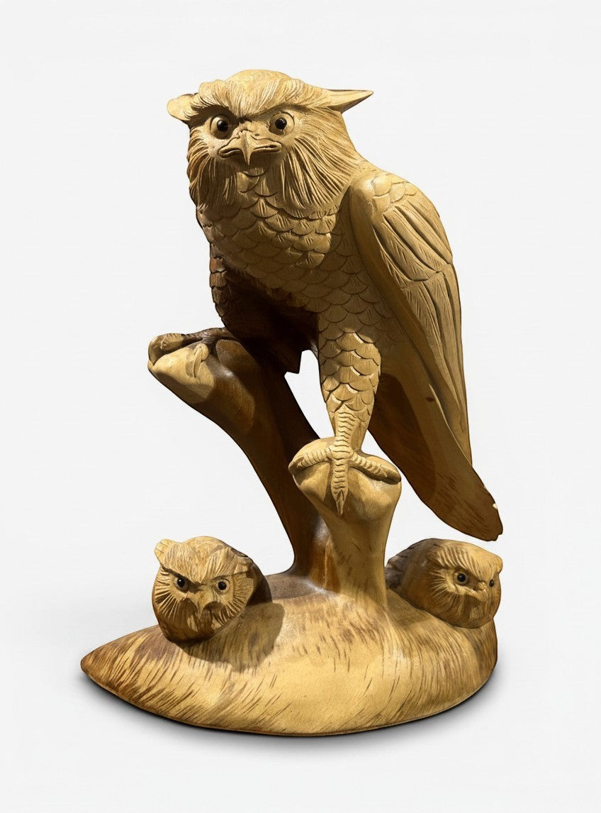 Natural Wonders USA wooden sculpture of a mantled owl with two fledglings, detailed feathers, perched on a branch. 24" tall.