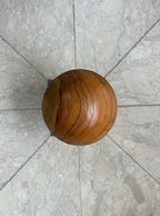 Natural Wonders USA mini wooden mushroom with smooth texture and natural grain, 7" round.