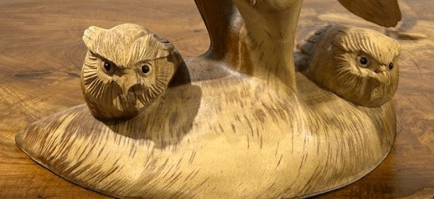 Natural Wonders USA wooden owl sculpture with two fledglings, symbolizing wisdom and family. 24" H x 7" W.