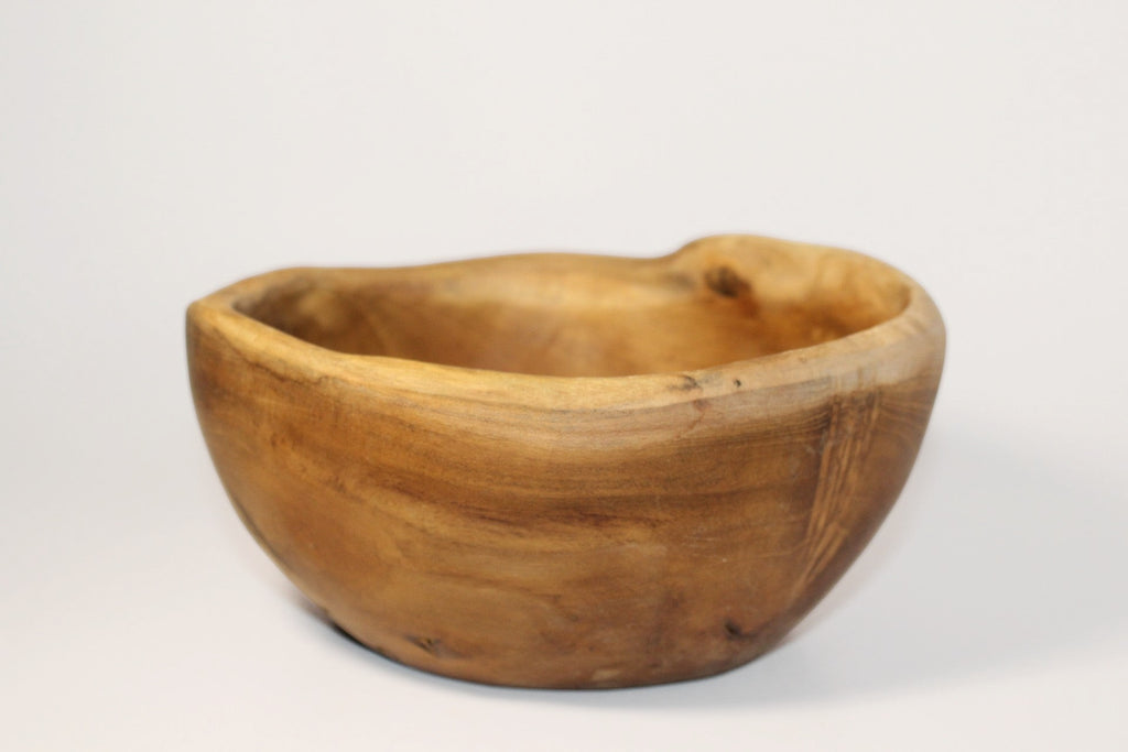 Natural Wonders USA rustic wooden serving bowl with unique grain pattern and irregular rim, perfect for salads or decor.