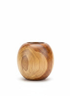 Natural Wonders USA teak wood pot with smooth, polished finish and visible grain. Golden-brown color, round shape.