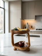 Natural Wonders USA teakwood tier stand with grapes, banana, and apple. 12" H x 10" W.