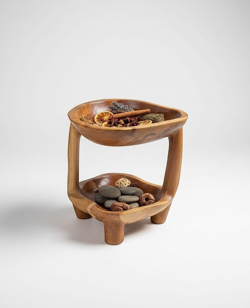 Natural Wonders USA teakwood tier stand, 12" tall, 10" wide, with two carved bowls for fruit or display.