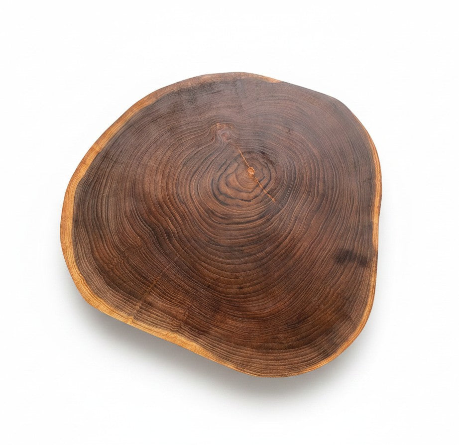 Natural Wonders USA 16" round teakwood lazy Susan with rich, warm color and visible wood grain. Food safe rotating tray.