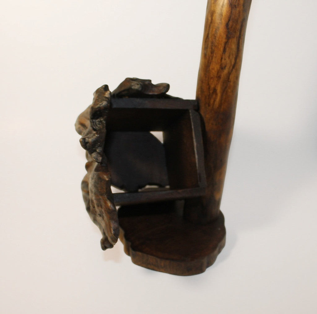Natural Wonders USA rustic wood wine bottle holder and glass stand, dark wood, sculptural form, unique handcrafted piece.
