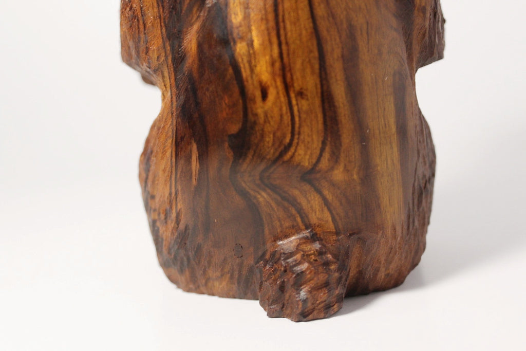 Natural Wonders USA rustic hand carved wooden bear figurine with intricate wood grain details.