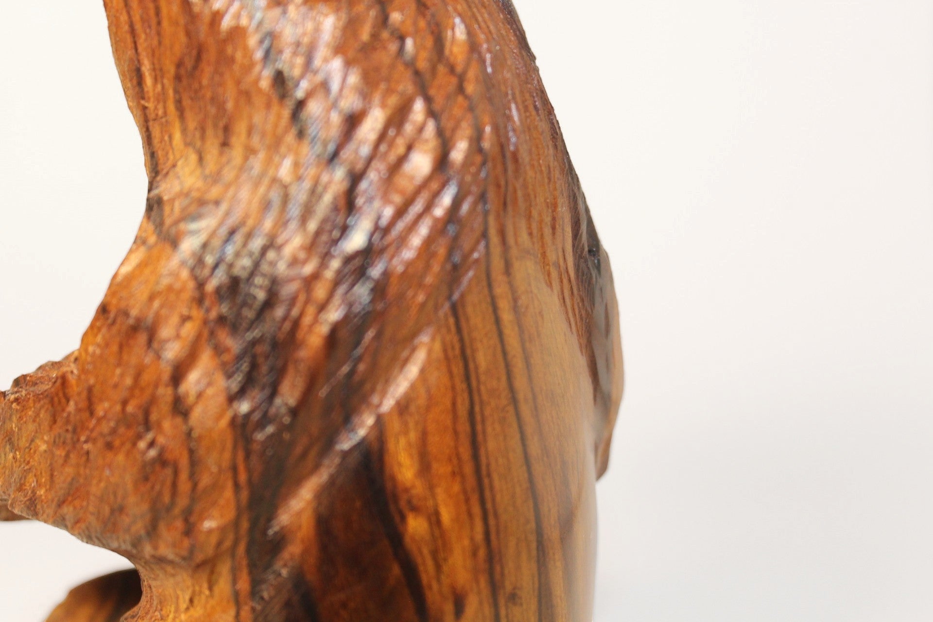Natural Wonders USA rustic hand carved wooden bear figurine with visible wood grain and warm earthy tones.