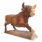 Natural Wonders USA hand-carved wooden bull sculpture, 10.5" tall x 11" long, showcasing wood grain and intricate details.