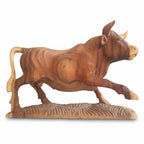 Natural Wonders USA hand-carved wooden bull sculpture, 10.5" tall x 11" long, showcasing natural wood grain and intricate detail.