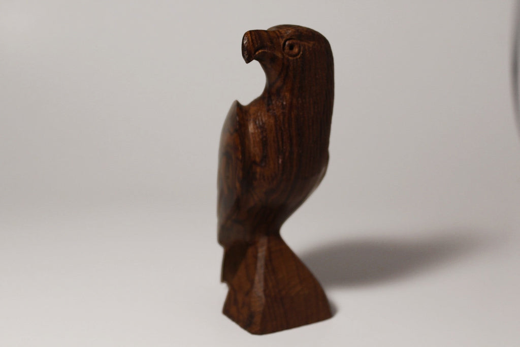 Natural Wonders USA hand-carved dark wood eagle figurine with detailed feathers and a polished finish.