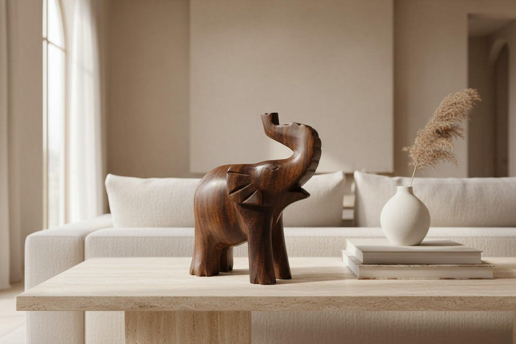 Natural Wonders USA dark wood elephant figurine with raised trunk, carved details, and natural grain.