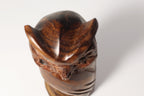 Natural Wonders USA hand-carved dark wood owl figurine with intricate feather details and natural grain patterns.