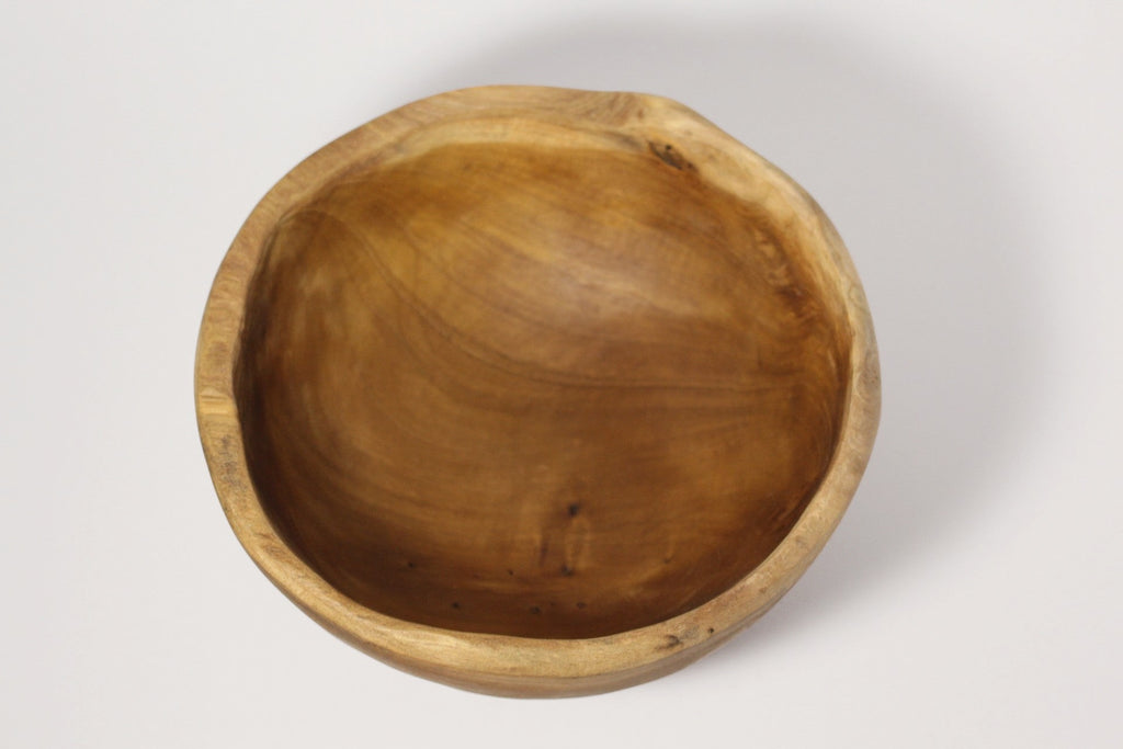 Natural Wonders USA rustic wooden serving bowl with unique grain pattern and irregular rim, perfect for salads or decor.